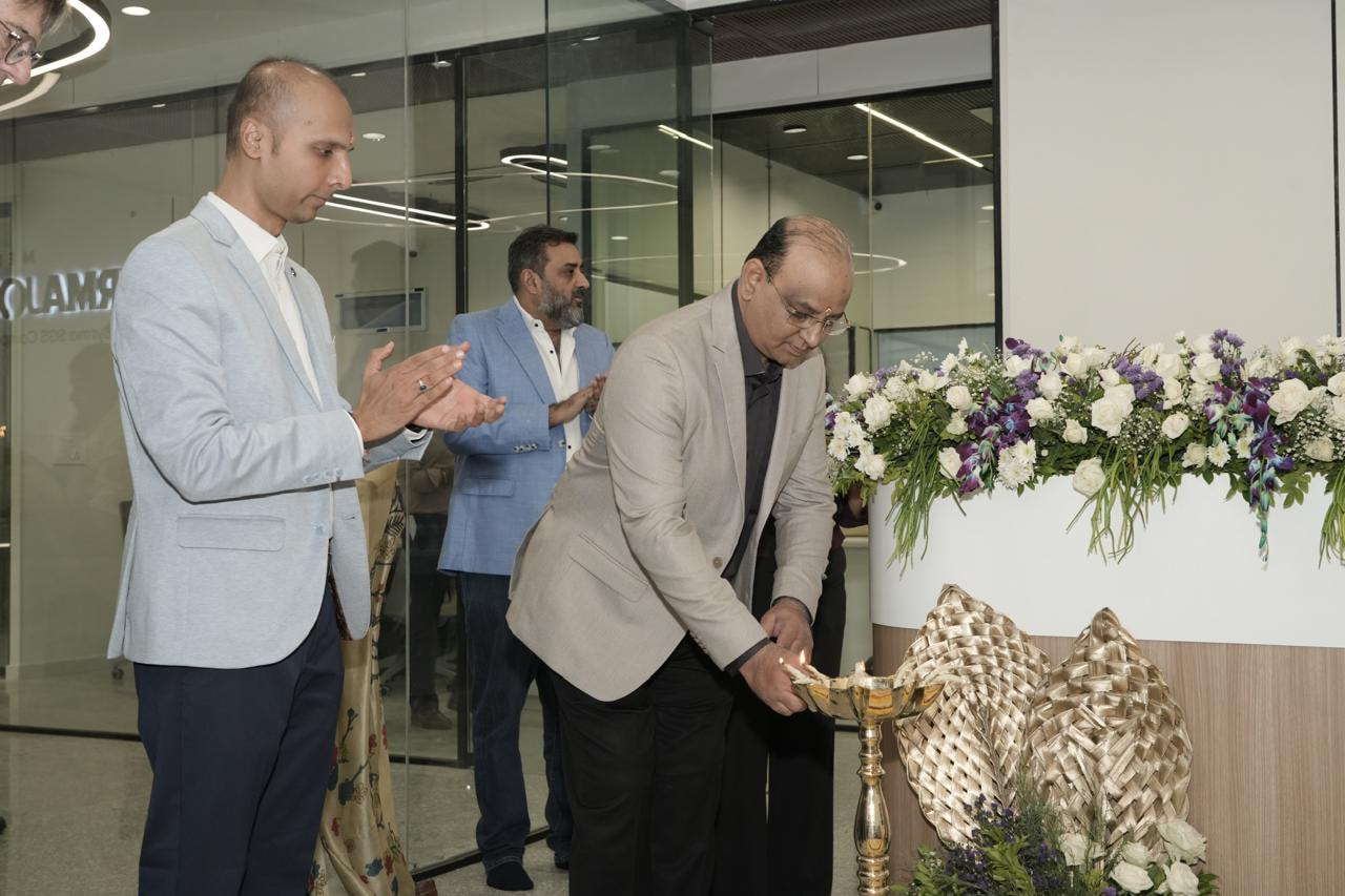 Ceremonial lamp lighting during the facility inauguration